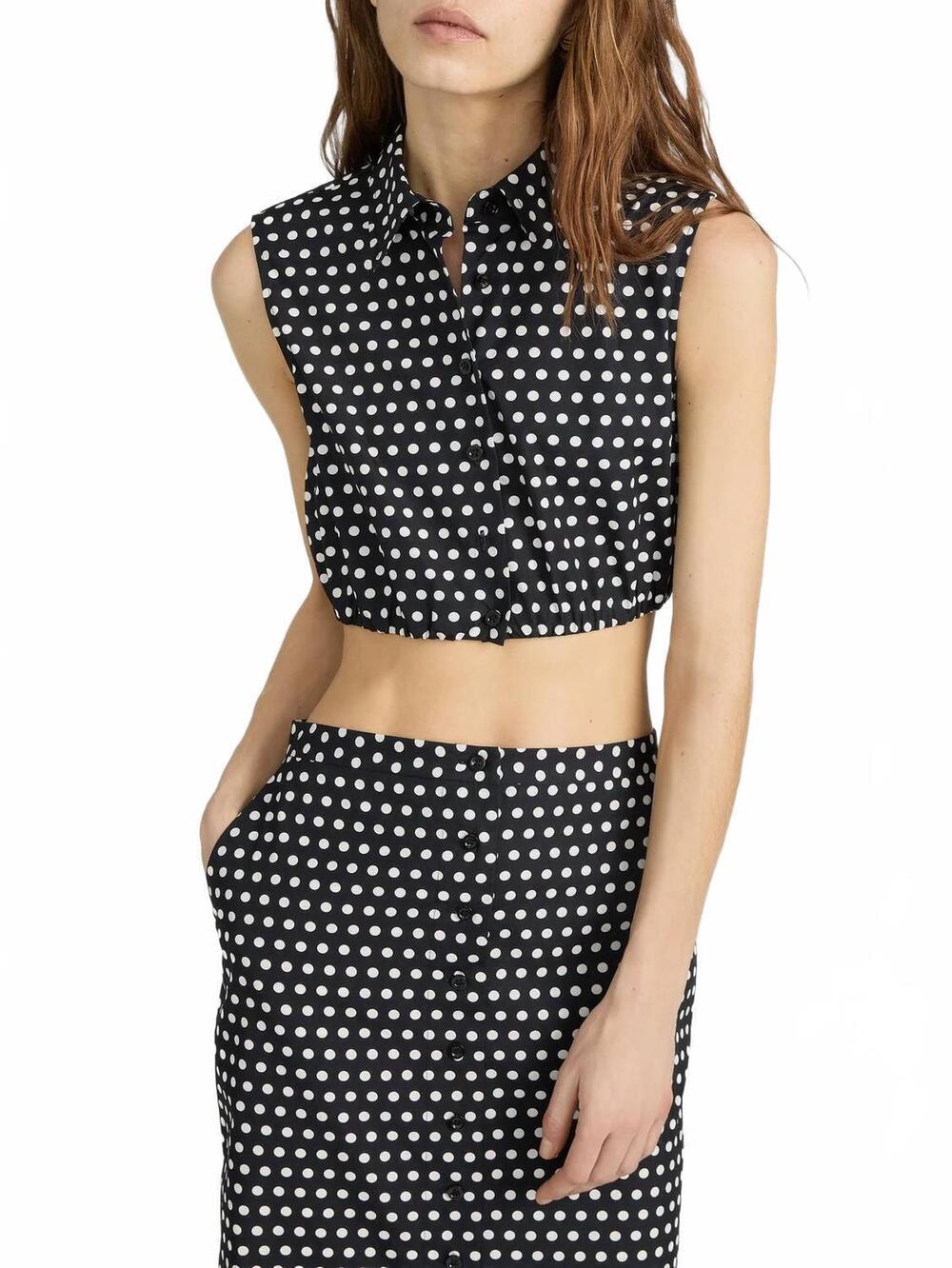 NEW FRAME polka dot crop top in black